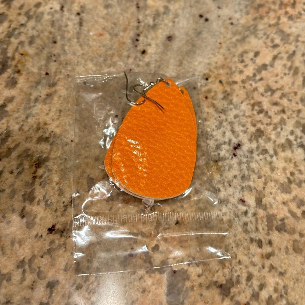 NWT Orange textured leather earrings